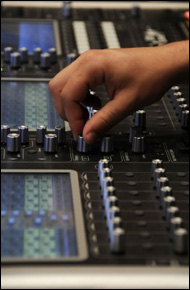 mixing board at a recording studio